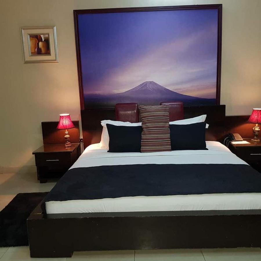 Apartment Royale Hotel & Suite Лагос Экстерьер фото